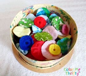 diy yoyo wreath with yoyo flowers, box of assorted fabric and knitted yoyos