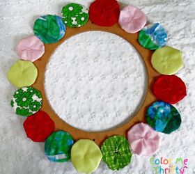diy yoyo wreath with yoyo flowers, attaching yoyos to mdf wreath frame with hot glue