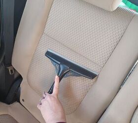 A squeegee lifts stubborn pet hair from seats and carpets
