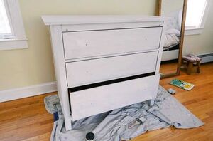 This has got to be the BEST reason to paint a piece of furniture white