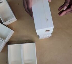 Gluing together wooden crates to form the main organizer structure