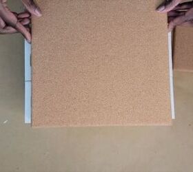Attaching cork boards to the sides to complete the structure