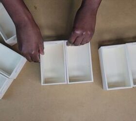 Laying out wooden crate bins to design a DIY desk organizer