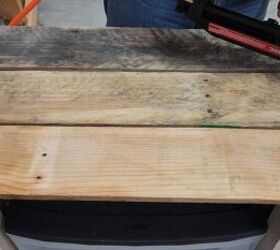 Securing the top wood panels to complete the sturdy frame