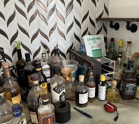 She found such a clever way to organize her bar that added tons of personality in the process