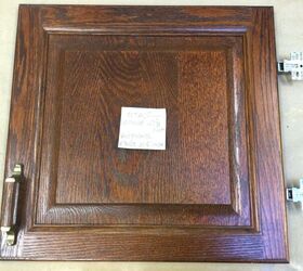 She brought this oak cabinet door in from the street for this beyond creative decor idea