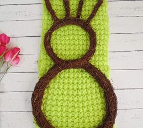 easy grapevine easter bunny wreath, Easter Bunny frame placed on top of green knitted scarf