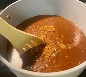 She dumps 2 tablespoons of cinnamon into a saucepan for this brilliant spring hack