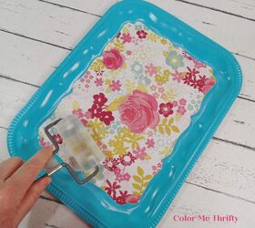 easy diy thrift store tray makeover, using brayer to smooth down floral paper onto metal tray