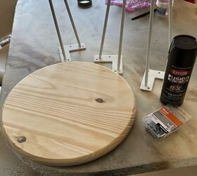 She used a jigsaw on this wood round to help give her living room a stylish boost