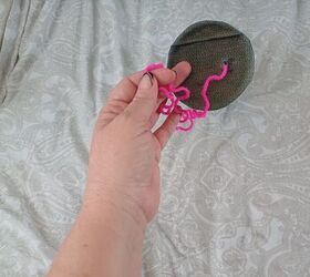 This DIY wool ball holder keeps your yarn neatly contained and easy to use 