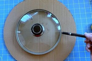 Put a pot lid on an old box for this spring accent we can't wait to try