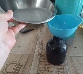 Pouring the mixture into a spray bottle