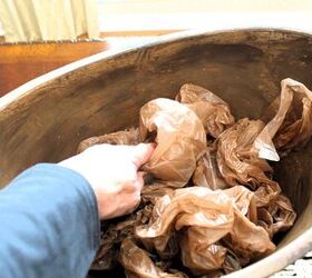 She stuffs plastic shopping bags into a bowl on her table for this clever decor idea