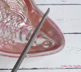 filing down edges of holes screwed into jello mold