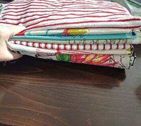 She grabs a few Dollar Tree hand towels and a tablecloth for this smart way to spruce up her home