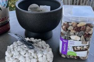 Pour some rocks in a bowl for this lovely outdoor idea (not for plants!)