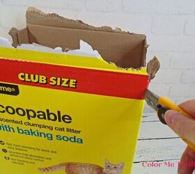 cat litter cardboard box makeover, cutting cardboard cat litter box at the corners with utility knife