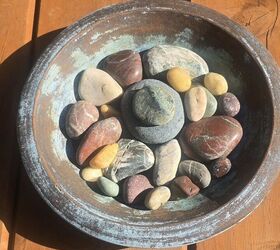 Stack some stones in an old dish or bowl for this quick way to improve your backyard