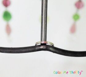 upcycled lampshade wind chime, split rings put on metal lampshade frame to attach hanging necklace sections