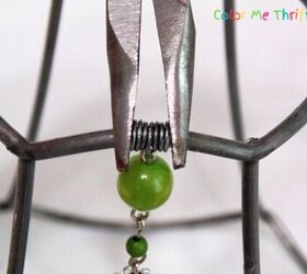 upcycled lampshade wind chime, tightening wire on lampshade frame with pliers