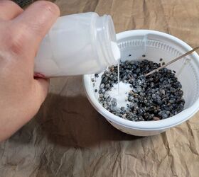 She pours glue and pebbles into a bunch of dollar tree terrariums for this enchanting decor idea