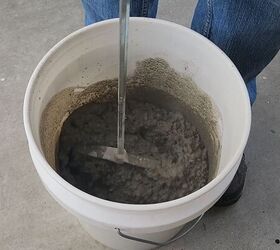 Mix the concrete with enough water to get the perfect consistency