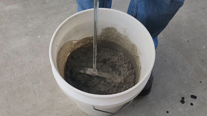 Mix the concrete with enough water to get the perfect consistency