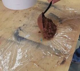 A spoodle is perfect for spreading the concrete evenly on the wrap