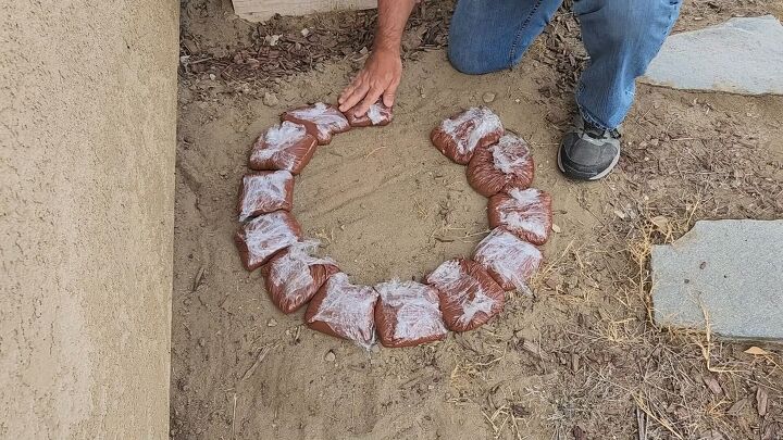 Create a circular garden bed with homemade concrete pavers
