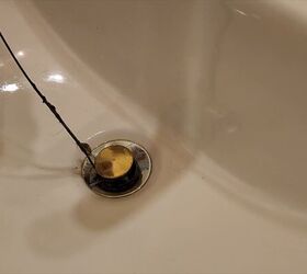 A zip tie does the trick for clearing out hair and debris from sink drains