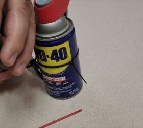 Never lose that WD-40 straw again with this clever zip tie hack