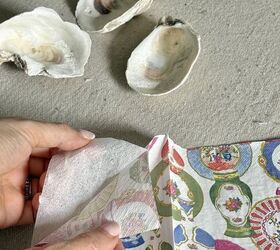 decoupage shells as wall art diy oyster shell flowers, Tearing away the top layer of a paper napkin