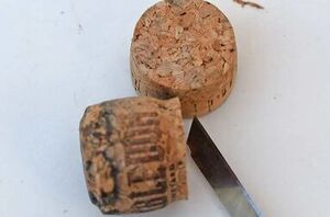 Use a few corks and flower pots to create the prettiest (& easiest!) summer accent