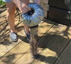 Turn a Bundt pan into a rain shield for your bird feeder