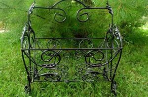 Bring an old magazine rack outside for this beautiful idea