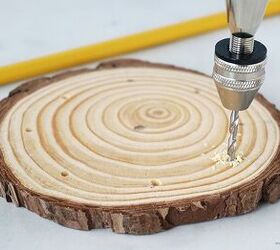 Drill holes in a wood slice for this gorgeous garden idea