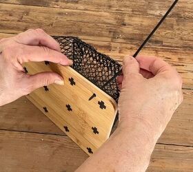Quick upcycle: board, basket, stencil, zip ties—done