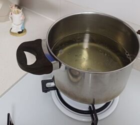 Steaming vinegar softens hard water stains for easier removal