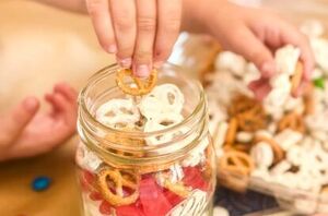 Pour some snacks into a jar for this smart and sweet summer hack