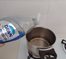 She mixes hot vinegar and Dawn dish soap together to create this powerful combination