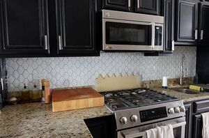 She tore off the old tile in her kitchen for this gorgeous makeover