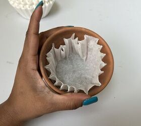 Keep soil from washing out with this simple coffee filter garden trick