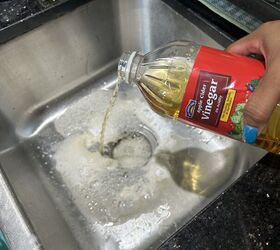 DIY garbage disposal deodorizer—baking soda followed by apple cider vinegar