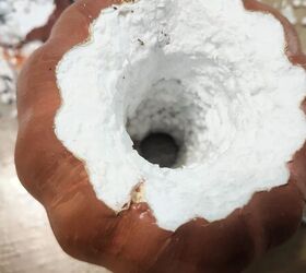 She carves out a hole in this styrofoam pumpkin for this high-end Pottery Barn dupe