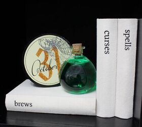 12 indoor halloween decor ideas that dont scream haunted house, Spell Book Stack or Floating Books