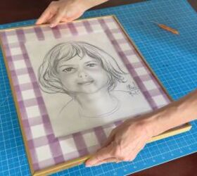 this simple trick makes hanging wall art 10x easier, Refreshed picture mat