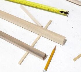 She uses a few dowels to boost her storage in a beautiful way