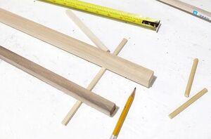 She uses a few dowels to boost her storage in a beautiful way