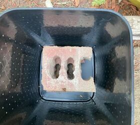 The brilliant reason she puts a brick in a waste basket and drags it outside